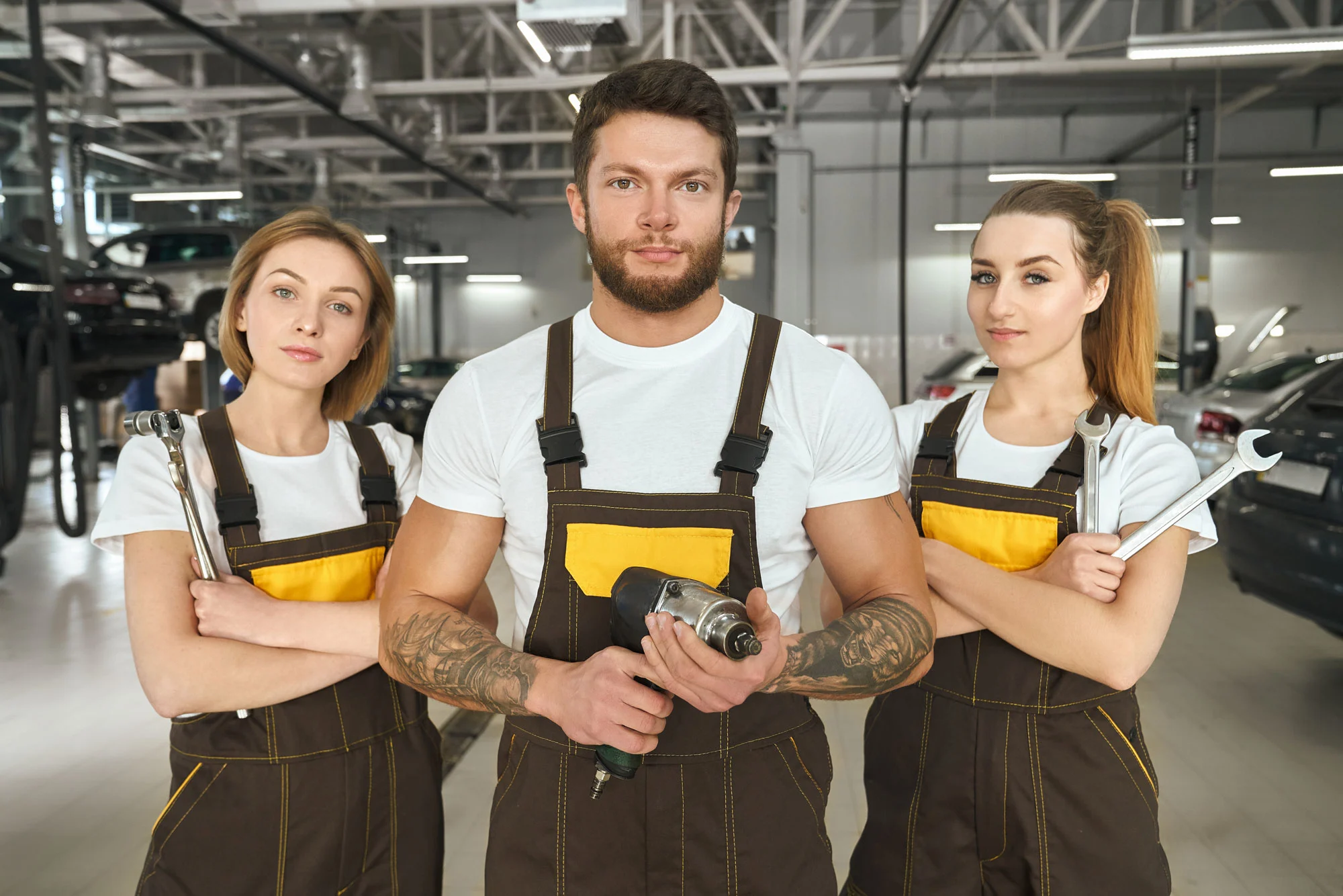 handsome man and women mechanics of autoservice po 2026 01 09 07 05 14 utc2